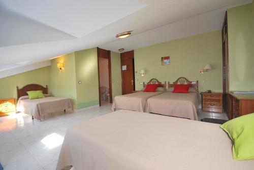 Letto o letti in una camera di Hotel Principado De Europa