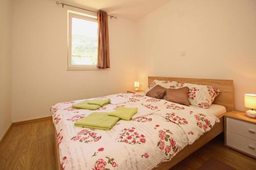 Postel nebo postele na pokoji v ubytování Apartments Vasilic-Cugalj-Smokvina