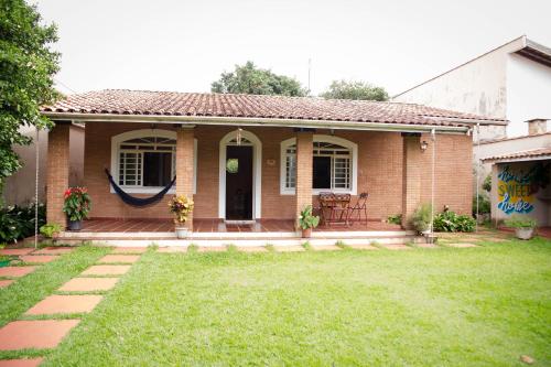 Κήπος έξω από το Casa com jardim e churrasqueira em Águas da Prata