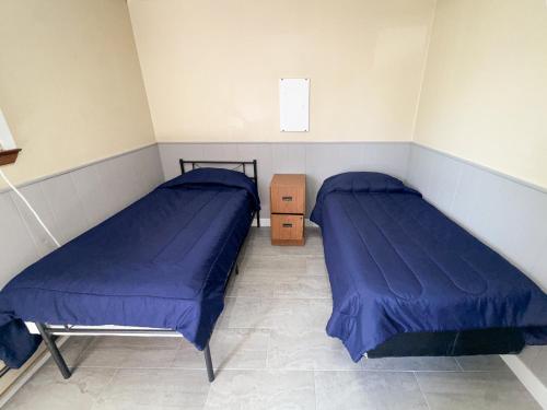 Ένα ή περισσότερα κρεβάτια σε δωμάτιο στο 5 Bedroom, 2 Bath, Ranch Style