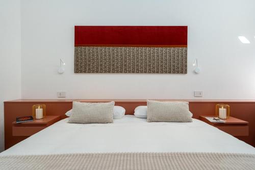 Ένα ή περισσότερα κρεβάτια σε δωμάτιο στο HabitArt