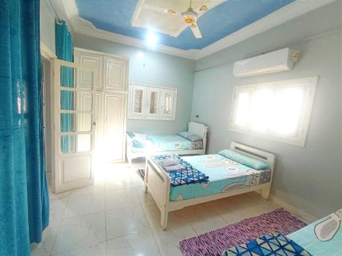 Postel nebo postele na pokoji v ubytování Winji Guest house