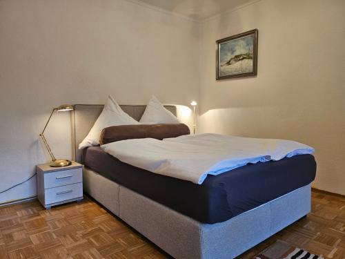 Ένα ή περισσότερα κρεβάτια σε δωμάτιο στο Ferienwohnung Große Bergluft Hahnenklee