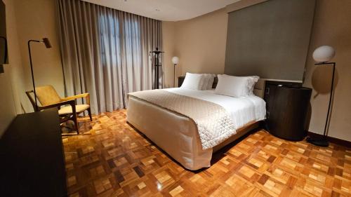 Postel nebo postele na pokoji v ubytování Hotel Glória Resort & Convention