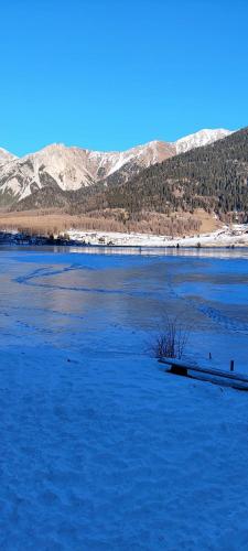 a large body of water with mountains in the background at Marlingsuites - Vinea - Wieser Josef - Marling in Marlengo