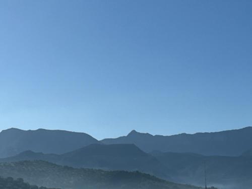 a view of the mountains in the distance at Casa Quietud in Algodonales