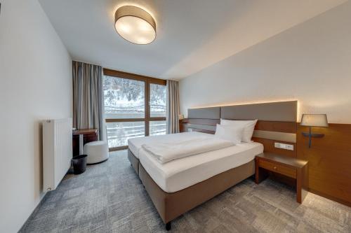 Posteľ alebo postele v izbe v ubytovaní Hotel Rundeck
