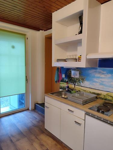Kuchyň nebo kuchyňský kout v ubytování Ferienwohnung Belvie 1
