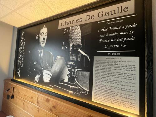a framed picture of a man with a camera at au petit quinquin in Céaux