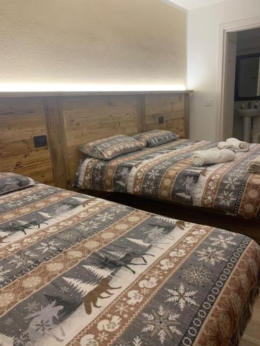 Ένα ή περισσότερα κρεβάτια σε δωμάτιο στο Agriturismo La Grange