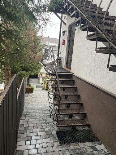 a set of stairs leading up to a building at Готельний комплекс Парламент, Яблуниця in Yablunytsya