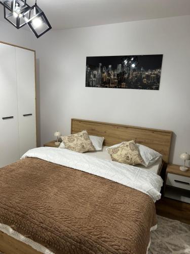Кровать или кровати в номере Jasminique Suite