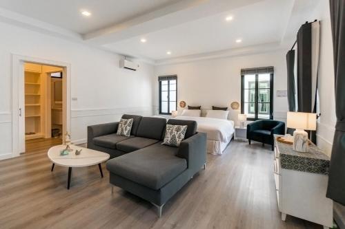 Ένα ή περισσότερα κρεβάτια σε δωμάτιο στο Tarn Villa Krabi