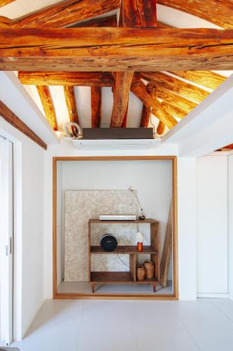 a living room with a large mirror on the wall at Cheongryang-Anchae 2BR 2BA Hanok Spa Free Parking in Seoul