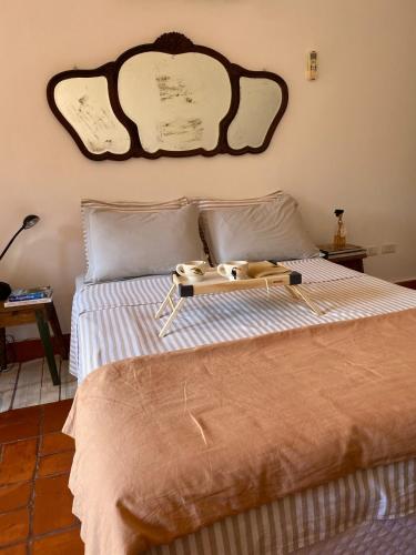 Ένα ή περισσότερα κρεβάτια σε δωμάτιο στο El cuartito Iguazu