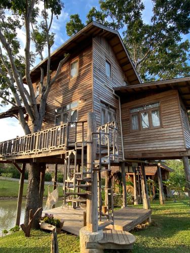 a large wooden house on a tree at Luxury Treehouse Khaoyai in Ban Nong Makha