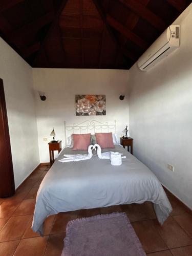 Postel nebo postele na pokoji v ubytování Casa Pedro