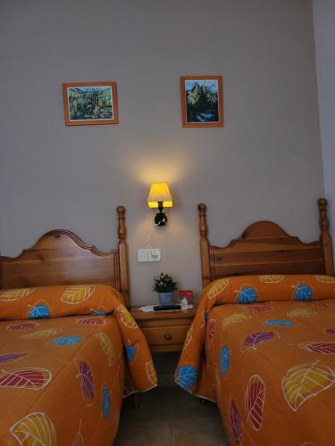 Katil atau katil-katil dalam bilik di Allotjament rural Casa Milagros