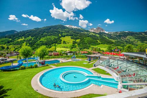 an overhead view of a swimming pool at a resort at Ferienhaus Antonia in Dorfgastein