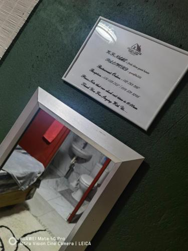 a picture of a bathroom with a toilet in a box at Fresh Ideas GuestHouse in Soshanguve