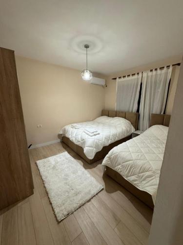 Lova arba lovos apgyvendinimo įstaigoje Rian apartament