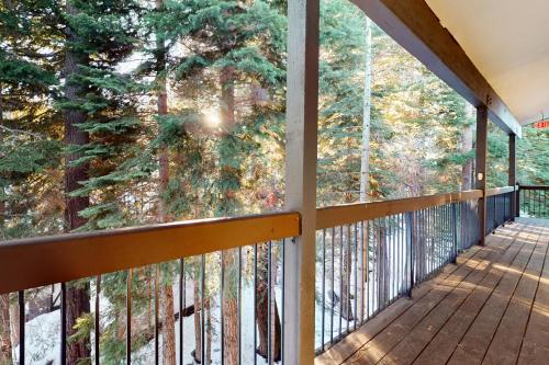 a balcony with a view of the trees at Squaw Valley Ski Flat in Olympic Valley