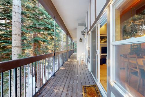 a balcony with a tree mural on the wall at Squaw Valley Ski Flat in Olympic Valley