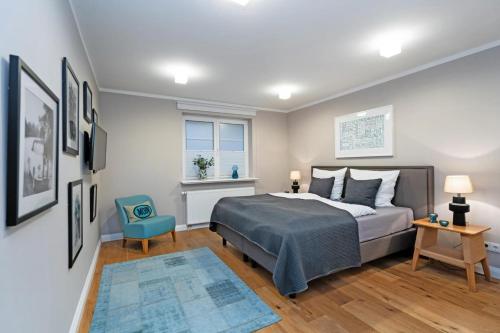 Postel nebo postele na pokoji v ubytování Coastline Sylt