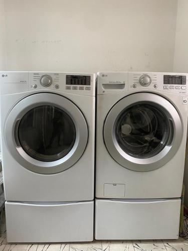 two washing machines are sitting next to each other at Casa Luna Suites-4 in Monterrey