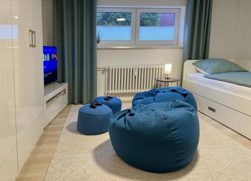 Postel nebo postele na pokoji v ubytování Lütte Deern