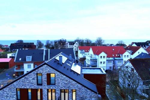 a view of a city with houses and roofs at Störtebeker 4 in Kellenhusen