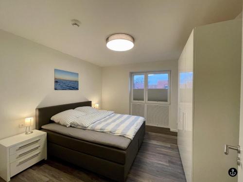 En eller flere senge i et værelse på Neue Liebe Haffkrug 3