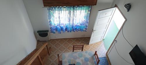 an overhead view of a room with a window at El nuevo amanecer mar de ajó in Mar de Ajó