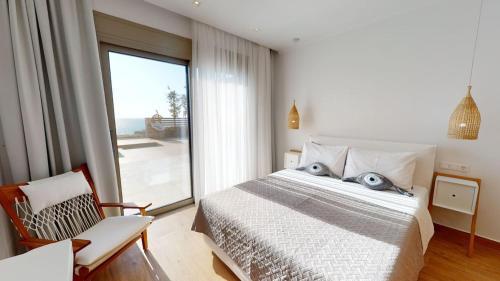 Posteľ alebo postele v izbe v ubytovaní 3 Muses Luxury Villas