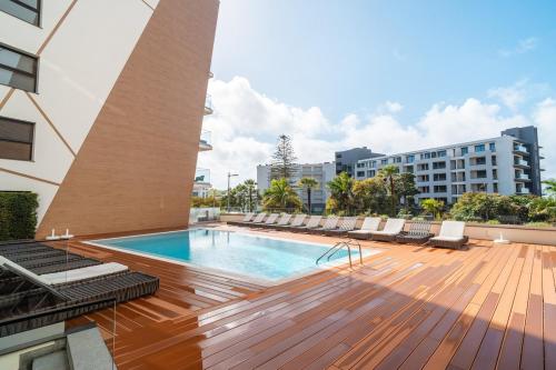 Suite Q - Supermarket - Pool - AC - Private Parking Spot
