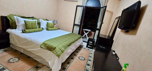 TV a/nebo společenská místnost v ubytování Luxury apartment in Gueliz, near the Majorelle Garden and Yves Saint Laurent Museum