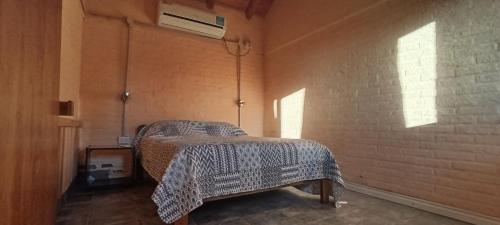 Postel nebo postele na pokoji v ubytování El Mangrullo