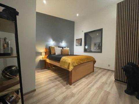 a bedroom with a bed in a room at Villa Plein la vue en 360° in Coublevie