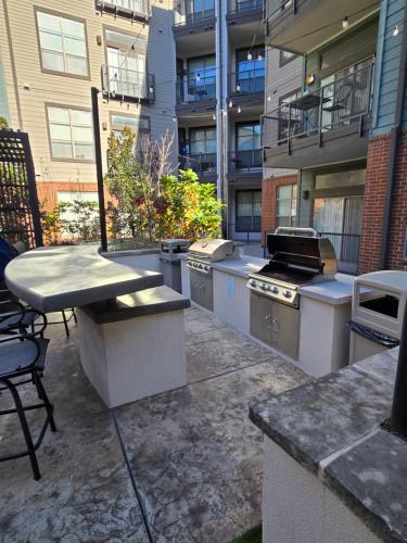 a outdoor patio with a bunch of appliances at Cozy 1bedrm/1bed/air mattress in Dallas
