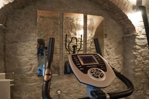 a cell phone is hanging on a wall at Luxury Apartments Manarola by Arbaspàa in Manarola