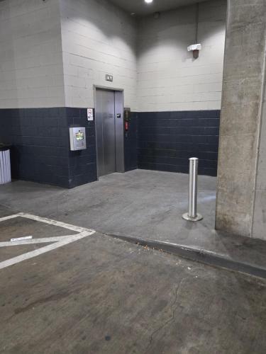 an empty room with a door in a building at Cozy 1bedrm/1bed/air mattress in Dallas