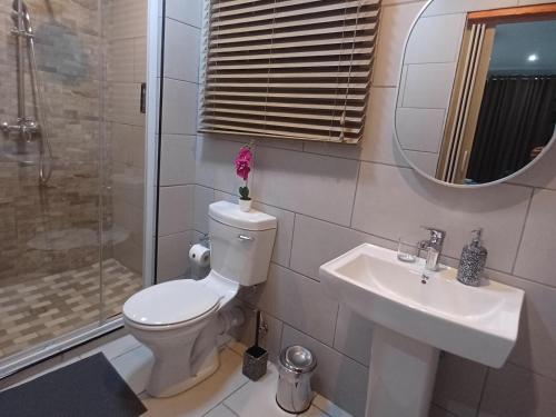 Ένα μπάνιο στο Delux Guesthouse