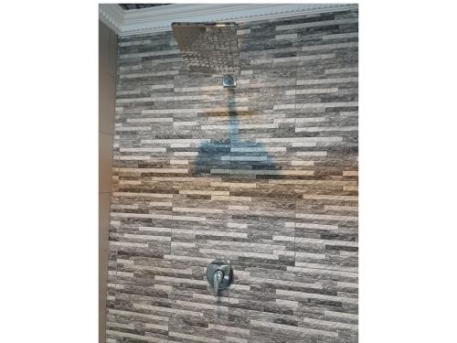 Ένα μπάνιο στο Delux Guesthouse