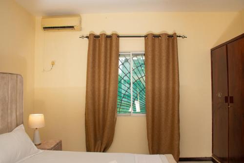 Shree enclave east courtにあるベッド