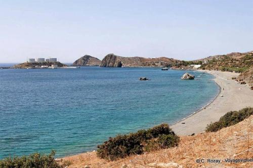 a view of a beach with rocks in the water at Anastasia's House in Plátanos