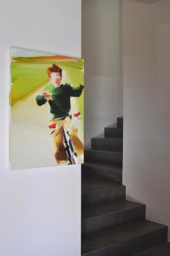 a painting of a man riding a bike down a staircase at Bfour in Pergine Valsugana
