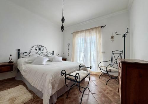 Ένα ή περισσότερα κρεβάτια σε δωμάτιο στο Villa Nicolas