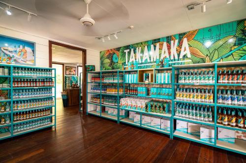 a store with a lot of products on display at Aran Apartments in Au Cap