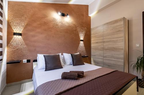 Posteľ alebo postele v izbe v ubytovaní D&A Apartments