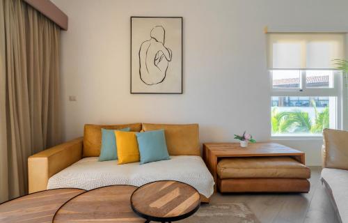 Χώρος καθιστικού στο Beach front apartment with private beach